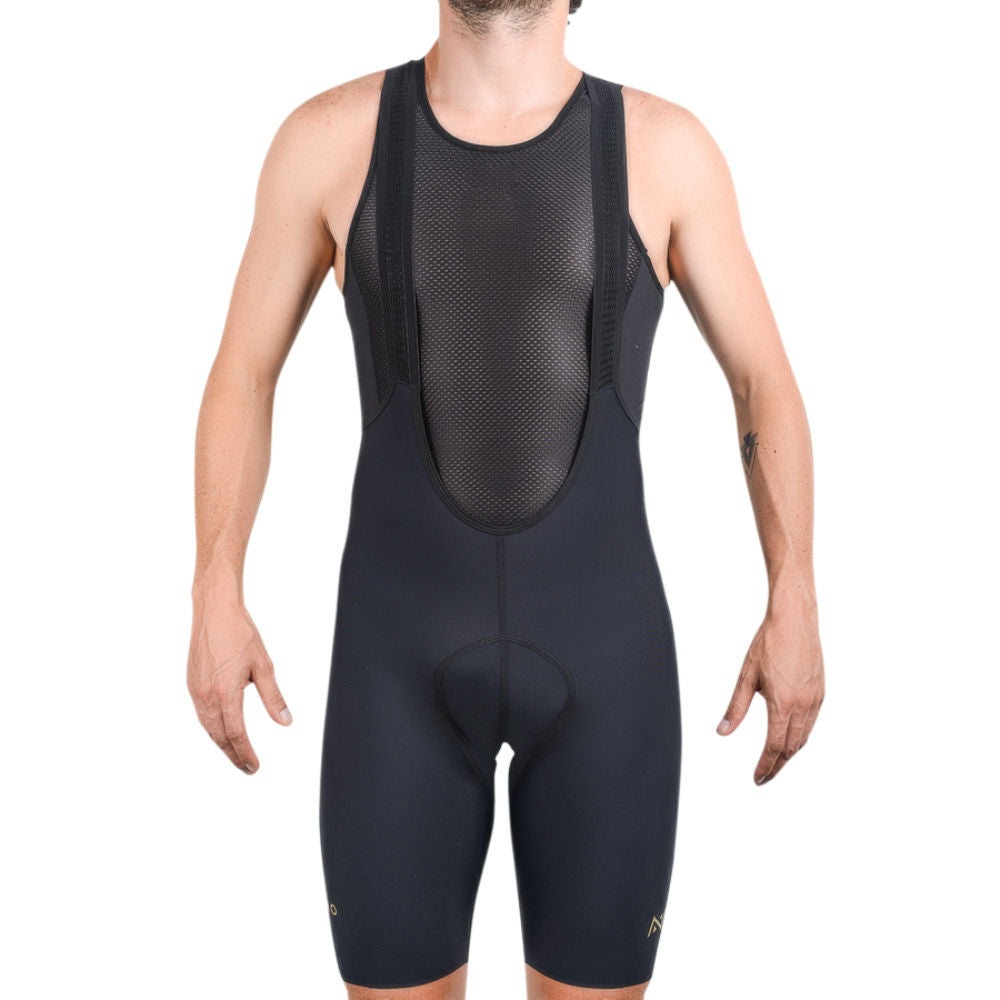 BIB SHORT H SIN COSTURAS APLIQUE DORADO